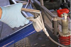 Picture of Lincoln Lube 1134 Extra Heavy-Duty Pistol Grip Grease Gun with 18" Hose and 6" Rigid Tube